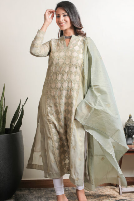 Elegant pista green Lucknowi Chikankari unstitched kurta dupatta set by Srajann.