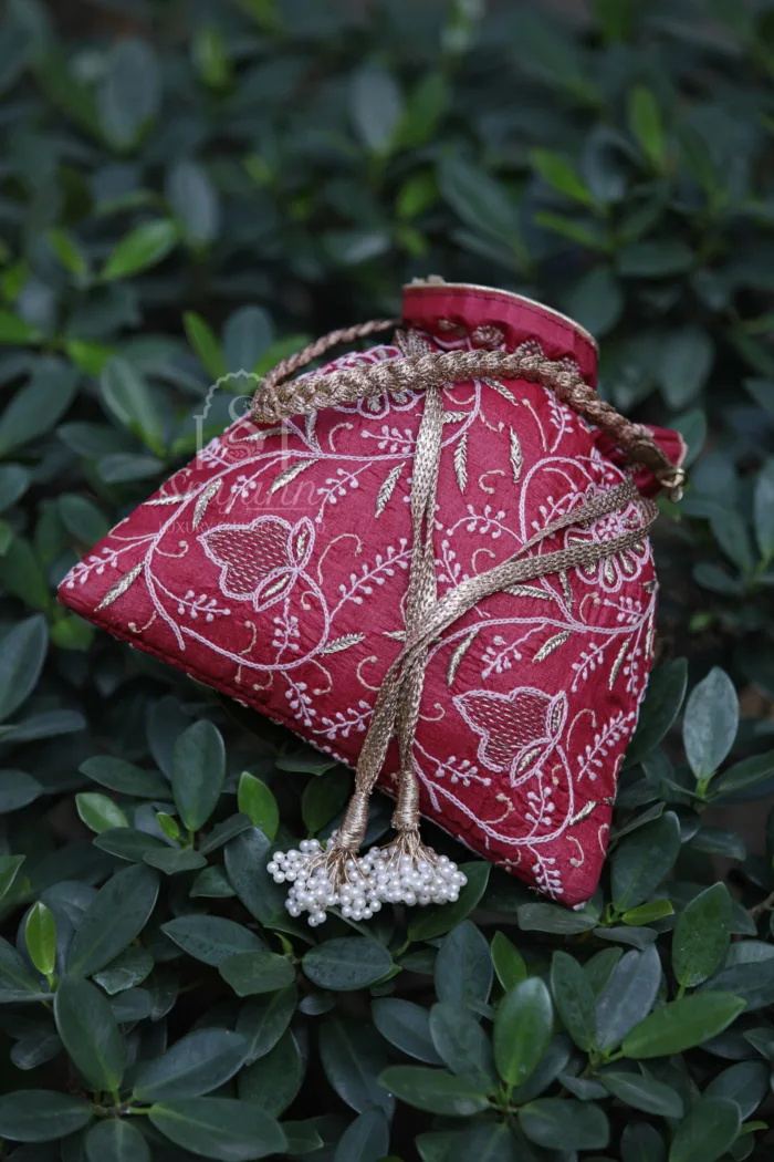 "Red Silk Lucknowi Chikankari Potli Bag adorned with Zari Embroidery"
