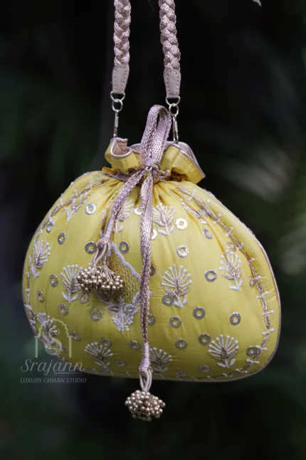 "Corn Yellow Silk Lucknowi Chikankari Potli Bag with Muqaish Embellishments"