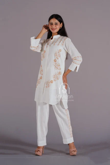 Hand-Embroidered White Linen Lucknowi Chikankari Co-Ord Set: A coordinated set featuring intricate hand embroidery in the traditional Lucknowi Chikankari style, crafted from premium white linen fabric