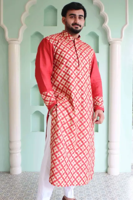 Red Moonga Silk Lucknowi Chikankari Stitched Men's Kurta: A vibrant men's kurta crafted from luxurious red Moonga silk fabric, adorned with intricate Lucknowi Chikankari embroidery.