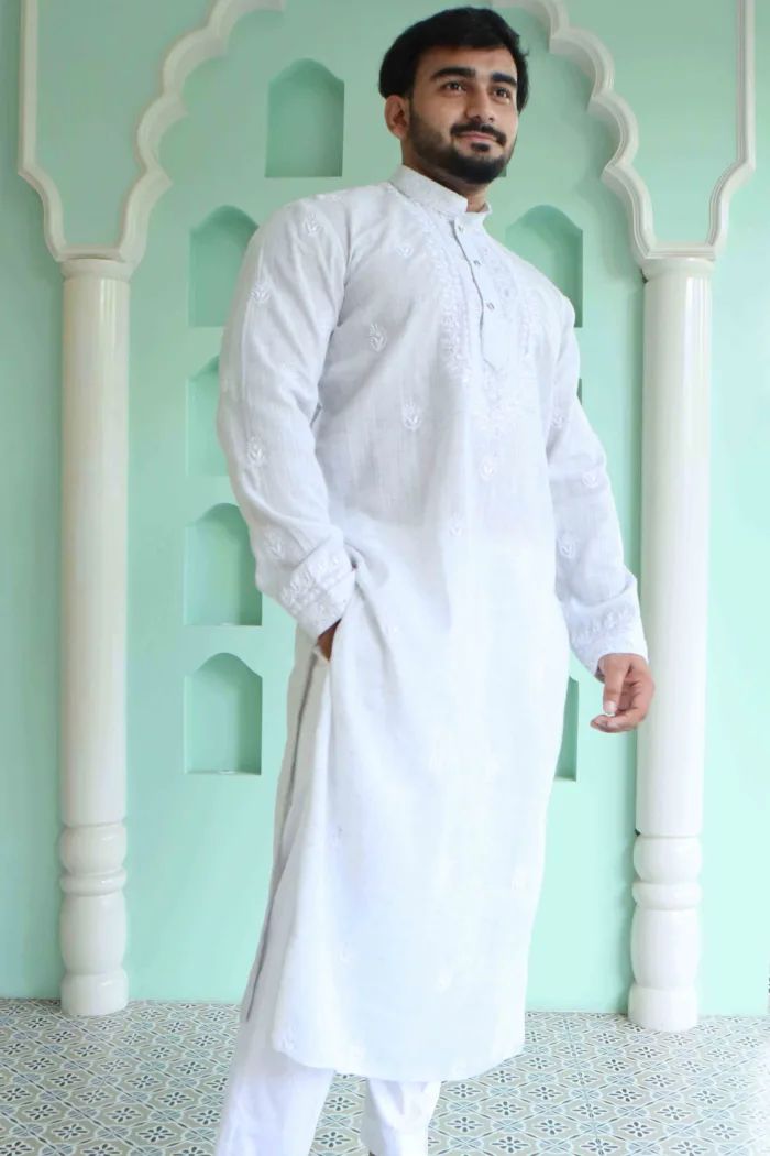 Hand-embroidered White Khadi Lucknowi Chikankari Stitched Men's Kurta: This exquisite men's kurta features intricate hand-embroidery in the traditional Lucknowi Chikankari style on premium white Khadi fabric.