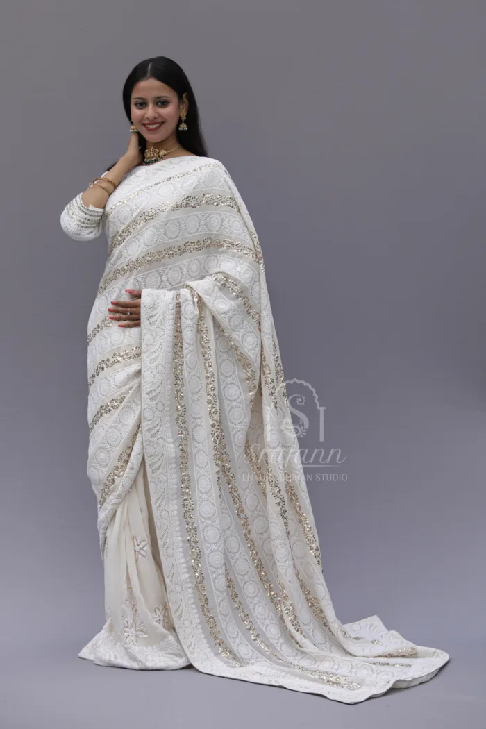 Handcrafted Off-White Pure Georgette Lucknowi Chikankari Saree/Blouse Ensemble by Srajann with Muqaish Embellishments