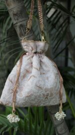 SOFT PINK CHIKANKARI POTLI