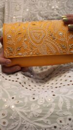 TANGERINE CHIKANKARI CLUTCH
