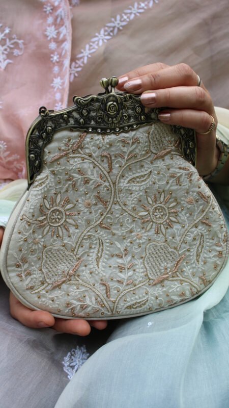 ivory ethnic clutch