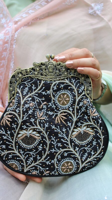 handcrafted black clutch