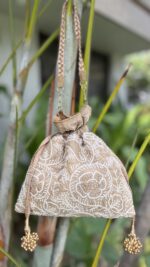 BEIGE CHIKANKARI POTLI